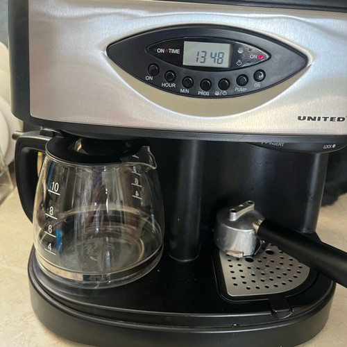 United coffee maker like new with milk frother