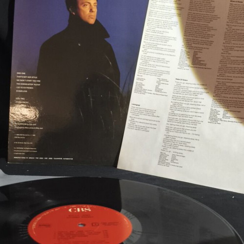 Billy Joel Storm Front vinyl record used, good condition