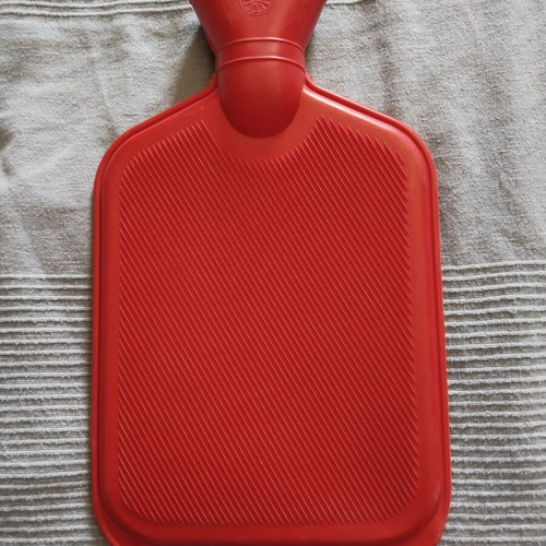 Hot water bottle with soft fabric cover new