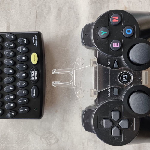 Speedlink Bluetooth Keyboard for PlayStation 3 used with USB receiver and controller stand
