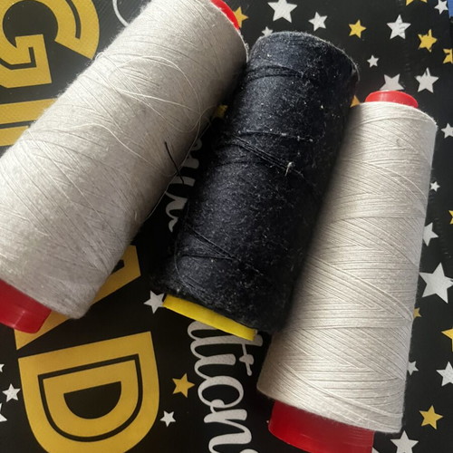 Sewing threads like new, three pieces, two ecru and one black