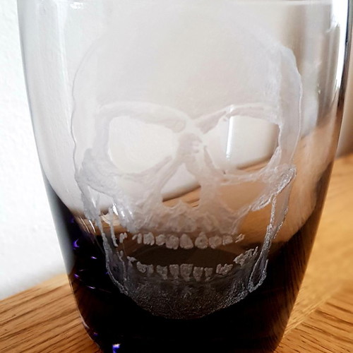 Collectible whiskey and vodka glasses, pack of 5, new with engraved skull