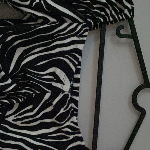Zebra print blouse new, animal print with puffed shoulder, size S