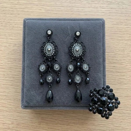 Vintage jewelry set with chandelier earrings and statement ring