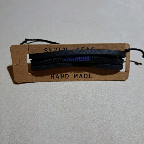 Handmade leather bracelet, unisex, with adjustable cord.