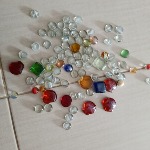Decorative glass pebbles like new, assorted colors and designs