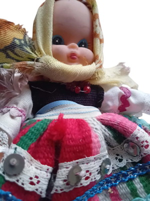 Vintage collector doll used with traditional costume and beads