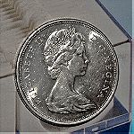  1965 canadian silver half dollar.