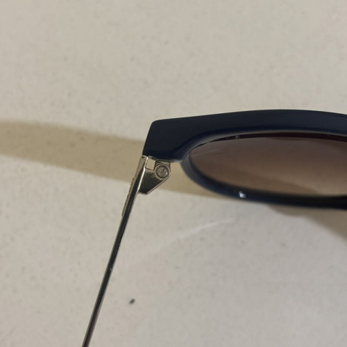 Vespa sunglasses like new, dark blue and silver frame with gradient lenses
