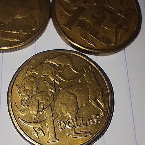 Australian coins used, pack of 4 one dollar pieces