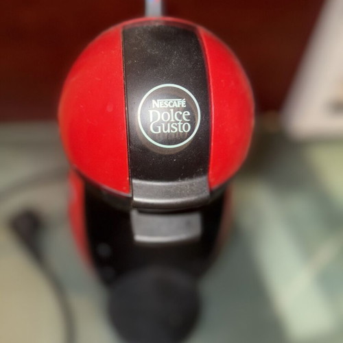 Nescafé Dolce Gusto coffee machine used, red design