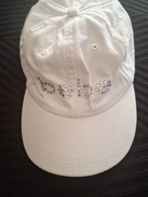 Bebe hat one size white like new