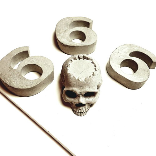 Handmade concrete skull decoration, gothic style