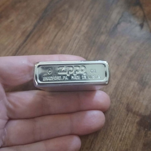 Zippo windproof lighter used with silver metal finish