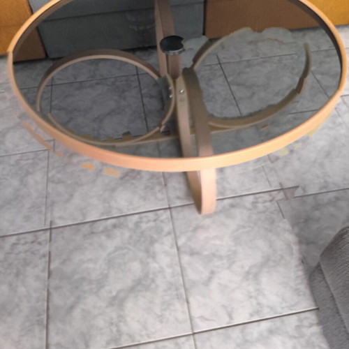 Round coffee table Tokyo with smoked glass and unique base