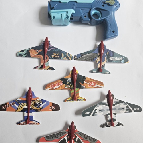 Children's toy gun with paper airplane launcher, new, set of 6 planes