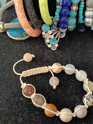 Set of 20 colorful jewelry pieces: 14 bracelets, 2 necklaces, 2 rings, 1 earring, 1 pendant