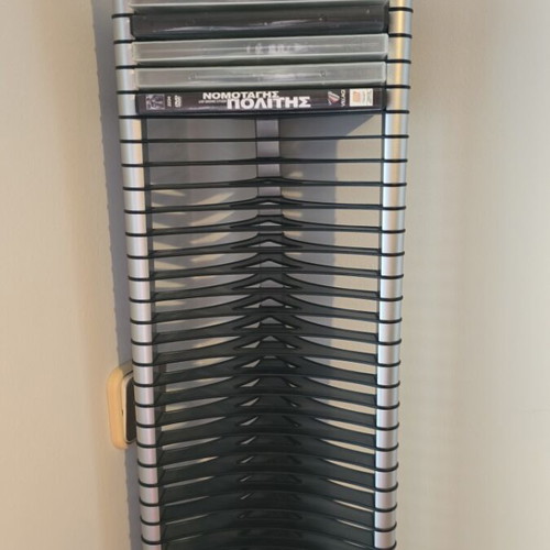 CD case with 35 slots like new, includes 5 plastic storage boxes