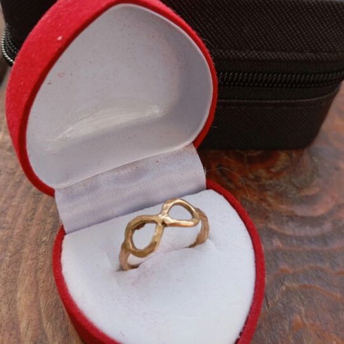 Gold infinity ring like new, made of steel