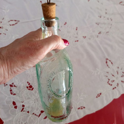 Vintage glass bottle Bormioli Rocco with vest and bow tie design, like new