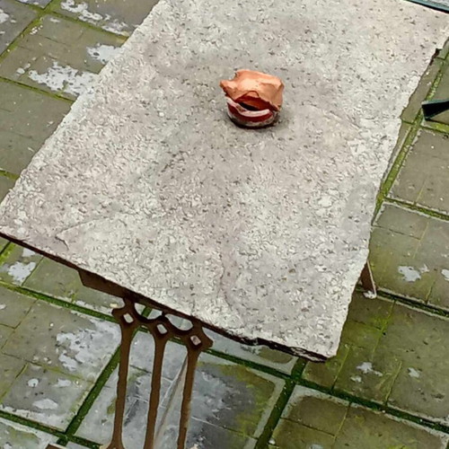 CAST IRON TABLE WITH STONE SURFACE-