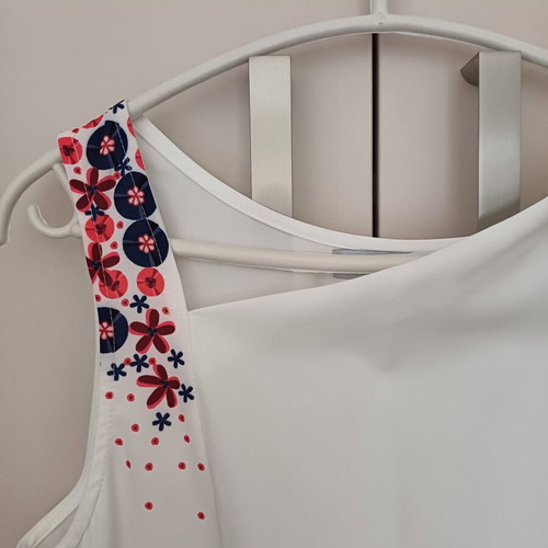 Midi white dress new with subtle design and asymmetric neckline size M