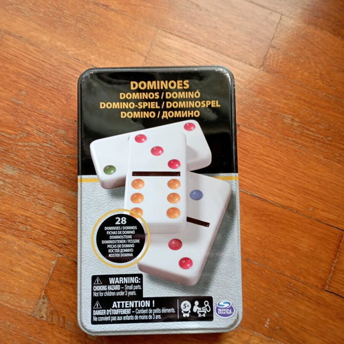 Domino game new in metal box, unused