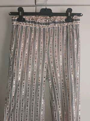 Bell-bottom pants with sequins like new, size M, black and beige, summer with shorts