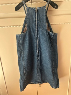 Attrattivo denim dress used with embroidered flowers and pockets