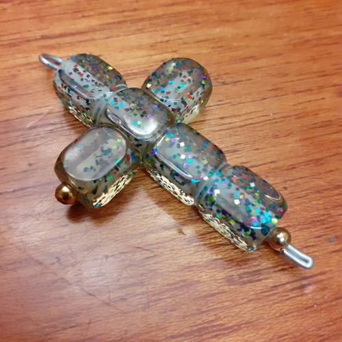 Cross large with glitter used, synthetic material