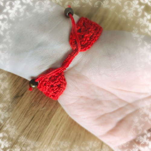 Knitted bracelet new red with beads made of cotton thread