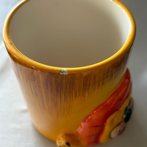 Children's ceramic mugs used, vintage with embossed elephant and lion