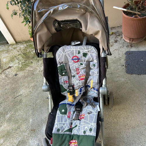 Maclaren stroller used with mosquito net and rain cover