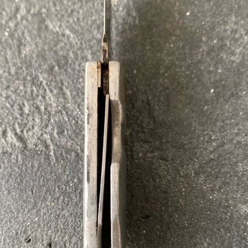 Small knife used, missing screw