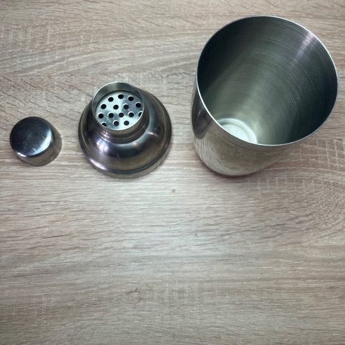 Cocktail shaker and jigger used, stainless steel