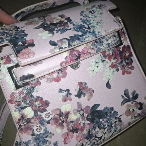 Handbag like new, pink with floral pattern, multiple pockets and strap
