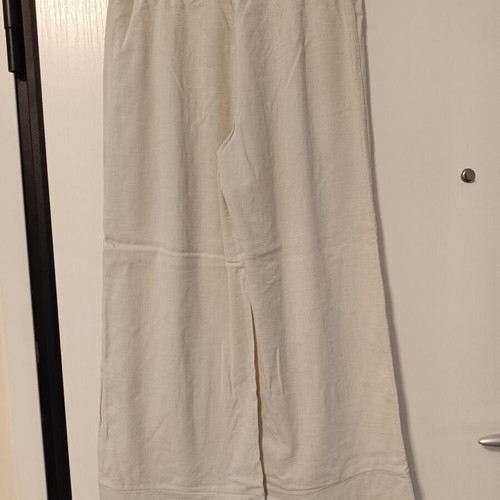 Women's loose beige pants with elastic waist and drawstring