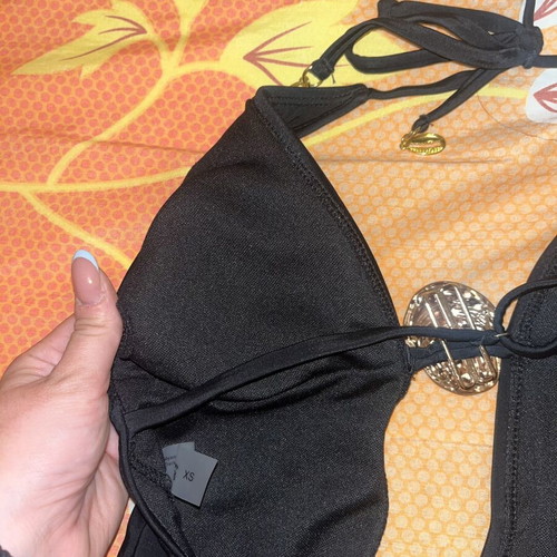 Swimsuit like new, black and multicolor, sizes XS and S