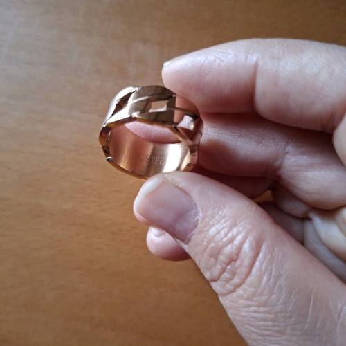 Stainless steel rings like new, pink and gold colors