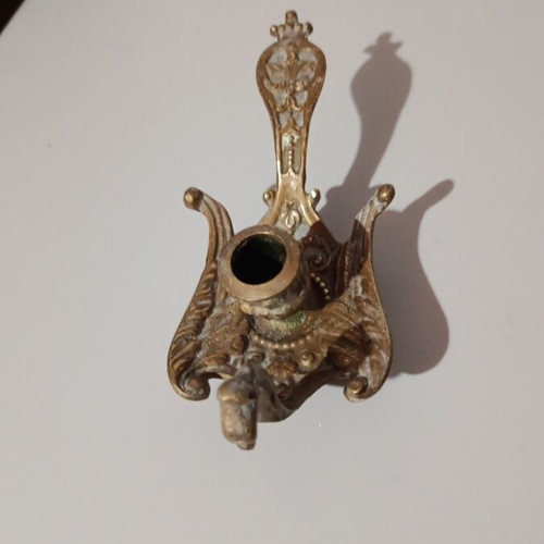 Bronze candlestick used, baroque style with embossed decoration