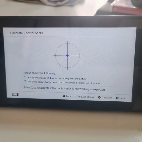 Nintendo Switch console with accessories and carrying case