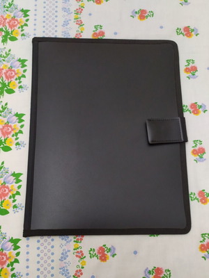 Black plastic folder, like new