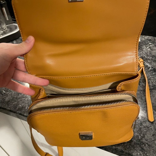 Chantal backpack bag used, orange with 2 straps and handle