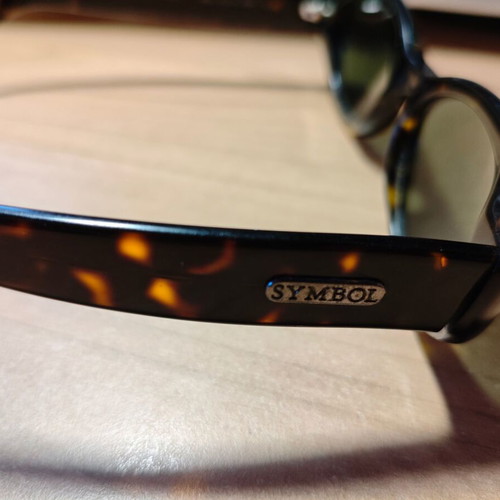 Vintage Symbol sunglasses tortoise shell frame with green lenses used