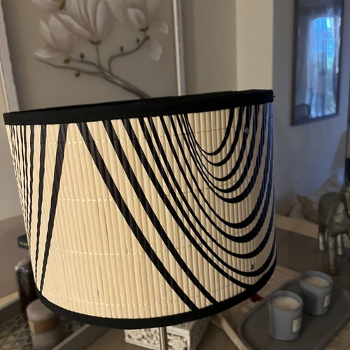Modern table lamp with black and white geometric shade, optical art