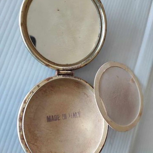 Powder compact used Made Italy with metal case and soft cover