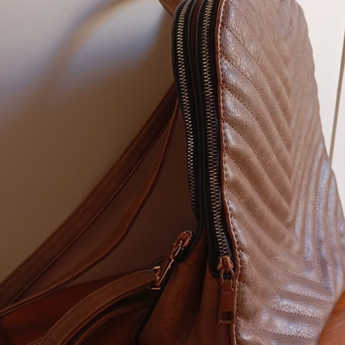 Backpack brown with double zipper like new