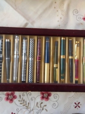 Collectible pens set of 36 with wooden case like new