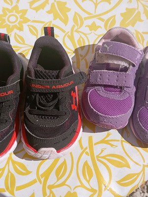 Children's black Under Armour no 21 sneakers used with gift purple Puma no 21 sneakers