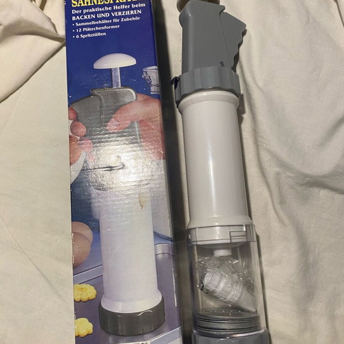 Cookie press like new for baking with various attachments